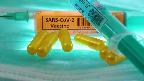 Two syringes for Sars-Cov2 coronavirus or Covid-19 vaccine Stock Footage 129464376