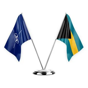 Two table flags isolated on white background 3d illustration, nato and bahama Stock Illustration