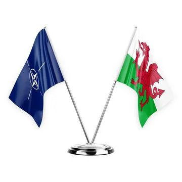 Two table flags isolated on white background 3d illustration, nato and wales Stock Illustration