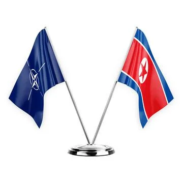 Two table flags isolated on white background 3d illustration, nato and north  Stock Illustration