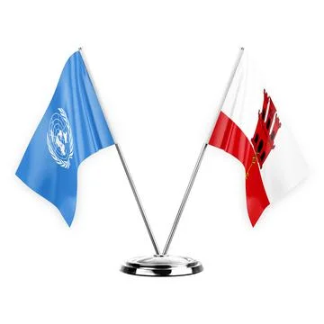 Two table flags isolated on white background 3d illustration, united nations  Stock Illustration
