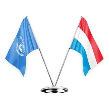 Two table flags isolated on white background 3d illustration, united nations  Stock Illustration
