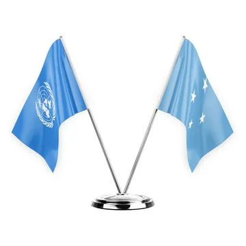 Two table flags isolated on white background 3d illustration, united nations  Stock Illustration