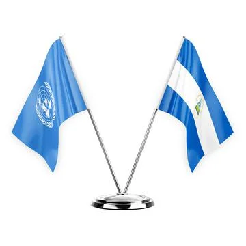 Two table flags isolated on white background 3d illustration, united nations  Stock Illustration