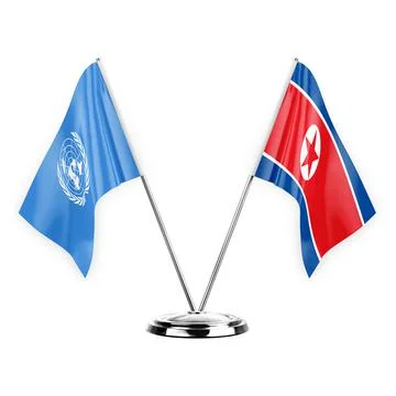 Two table flags isolated on white background 3d illustration, united nations  Stock Illustration