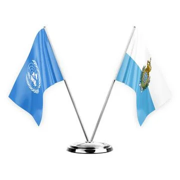 Two table flags isolated on white background 3d illustration, united nations  Stock Illustration