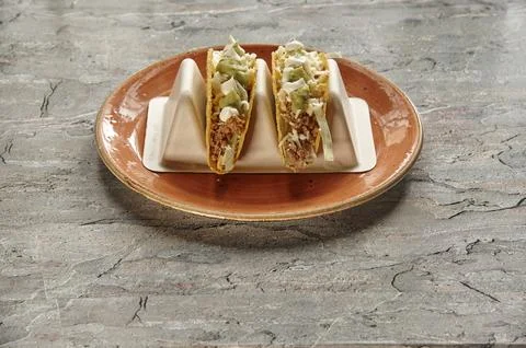 Two tacos on a plate Stock Photos
