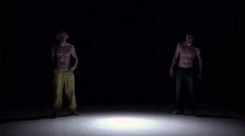 Two talanted dancers performing and continue dance breakdance on black, shadow Video stock 61178848