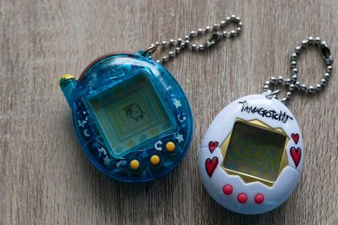 Two Tamagotchi Virtual Pets on the table Stock Photos