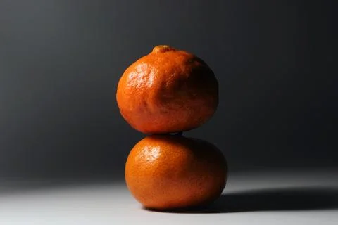 Two tangerines Stock Photos