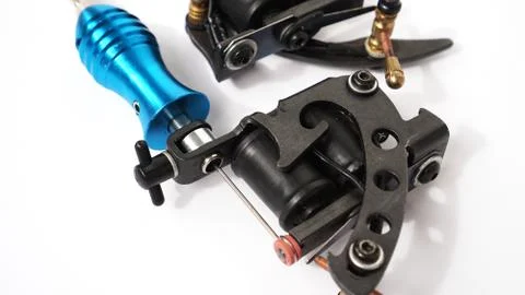 Two tattoo machines on a white background Stock Photos