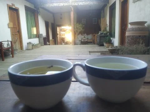 Two teacups in the hotel corridor Фото