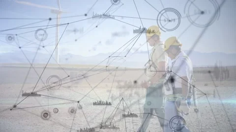 Two technicians walking toward wind turbine, initiating animated nodes Stock Footage 332544771