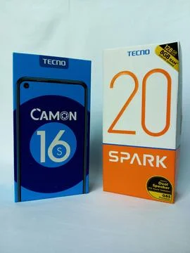 Two Tecno smartphone paper boxes package. Stock Photos
