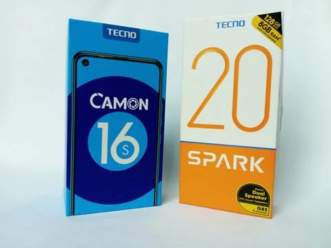 Two Tecno smartphone paper boxes package on white background. Stock Photos