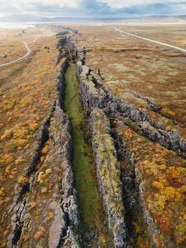 Two tectonic plates meeting on the surface of Earth in a long straight line in Stock Photos