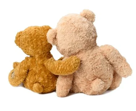 Two teddy bears sit with their backs on a white isolated background. Love ... Stock Photos