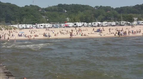 Two Teens Dive from Pier on Beach Video stock 11187666