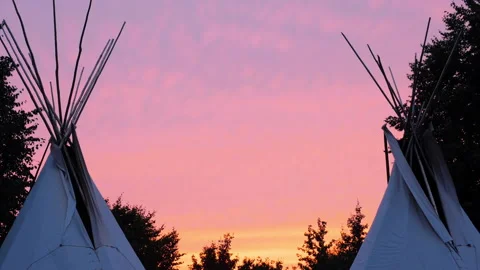 Two teepees with sunset in between 動画素材 146624611