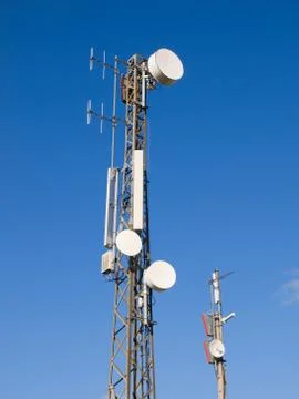 Two telecommunications antennas Stock Photos