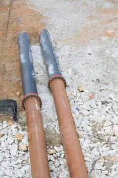 Two temporary drainage pipes Stock Photos
