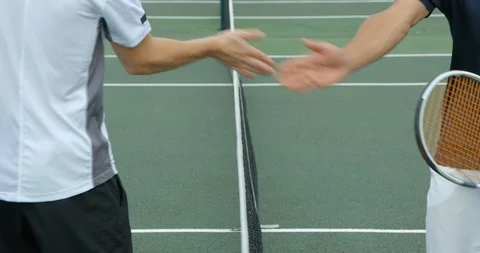 Two Tennis player 'Five'each other across the net. Vídeo Stock 101280101