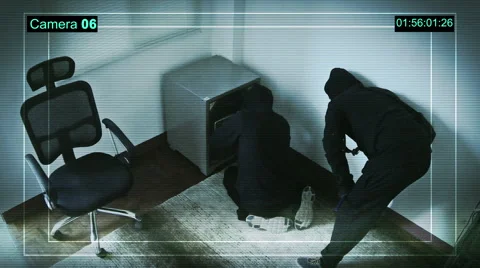 Two thieves enter the safe and take the money. Video from surveillance cameras. Stock Footage 61779754