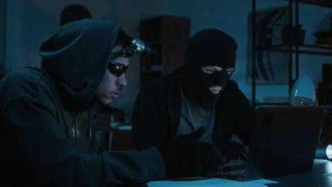 Two Thieves Using Laptop Trying to Steal CCTV Footage after Nighttime Robbery Stock Footage 321681425
