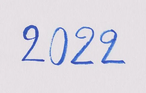 Two thousand and twenty two letters on white art paper. Stock Photos