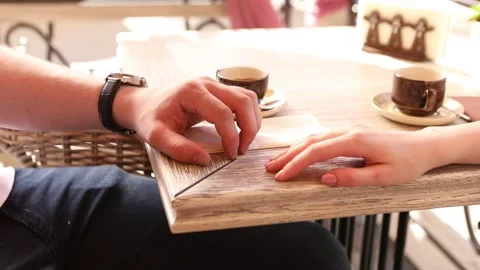 Two timid hands on a date. Two hands, male and female. Close-up. Видео 137228663