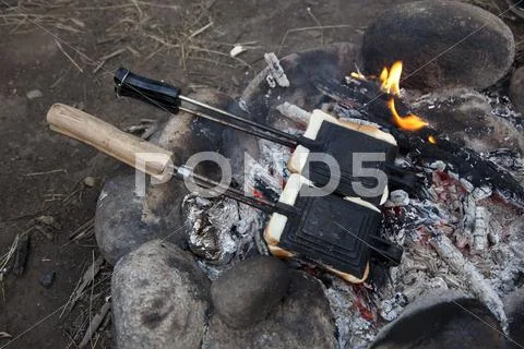 Two Toasted Sandwich Makers On The Campfire In Jindabyne, New South Wales,