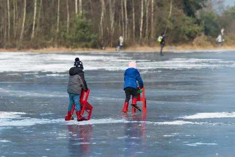 Two toddlers learning to skate Stock Photos