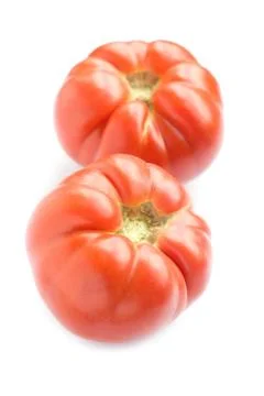 Two tomato on white Stock Photos