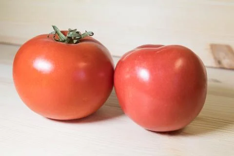 Two tomatoes Stock Photos
