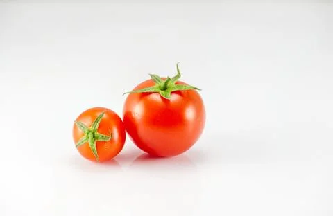 Two tomatoes on the white background Foto stock