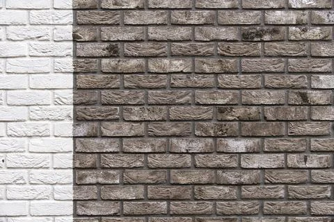 Two tone brick wall texture background contrast of white and dark brown bricks Stock Photos