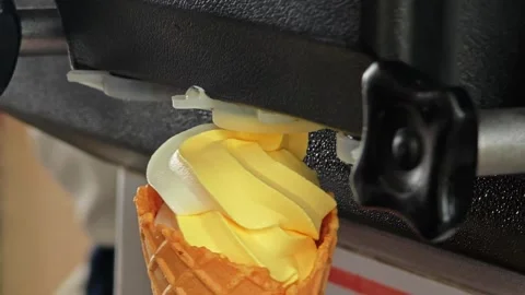 Two tone soft serve ice cream. Mango and Milk flavor. Video stock 304599769
