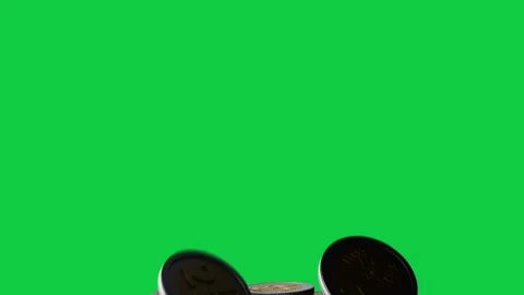 Two-toned coins dropping from top, rotating and colliding, forming low pile on Stock Footage 337887593