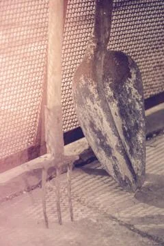 Two tools for garden work standing in the yard Stock Photos