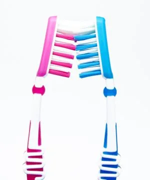 Two toothbrushes on white Stock Photos