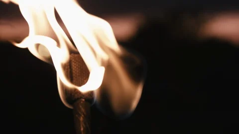 Two torches burning in sunset Stock Footage 121663608
