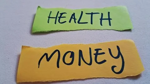 Two torn paper strips featuring the words health and money Stock Photos