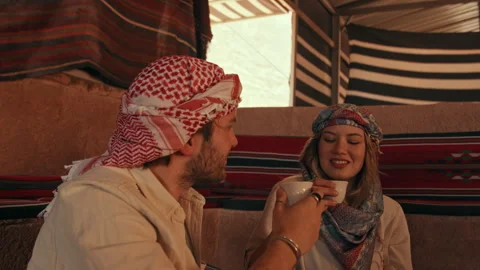 Two Tourists Drinking Bedouin Coffee Stock Footage 270345429
