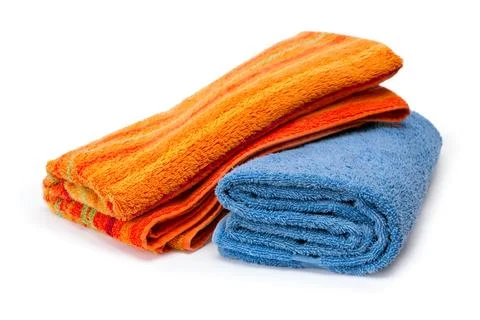 Two towels rolled up on a white background 写真素材