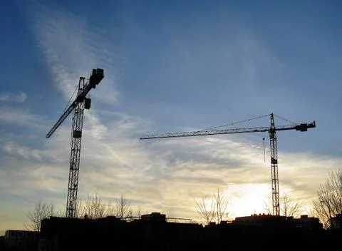 Two tower cranes Stock Photos