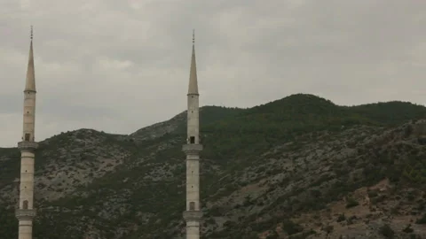 Two towers of minaret in mountain region Stock Footage 131549853