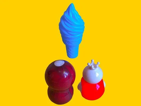 Two toy figures are looking at a toy ice cream Stock Photos