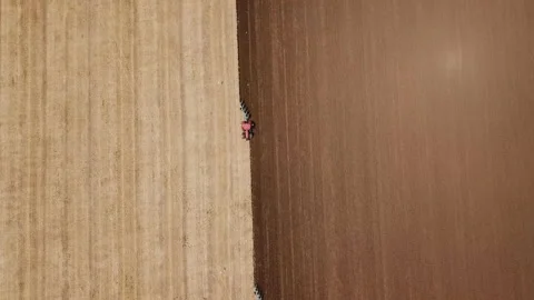 Two tractors plow the field Stock Footage 133760183