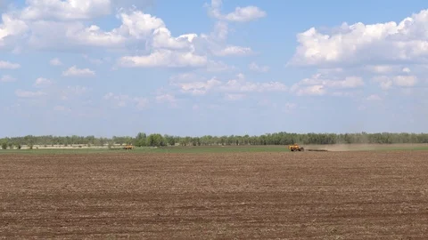 Two tractors two plow the field. Volgograd region, Russia Stock Footage 123133564