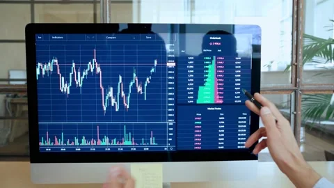 Two traders brokers stock exchange investors analyzing crypto trading charts. Stock Footage 164101608